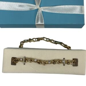 Avon Gold and Silver XOXOBracelet with Rhinestones